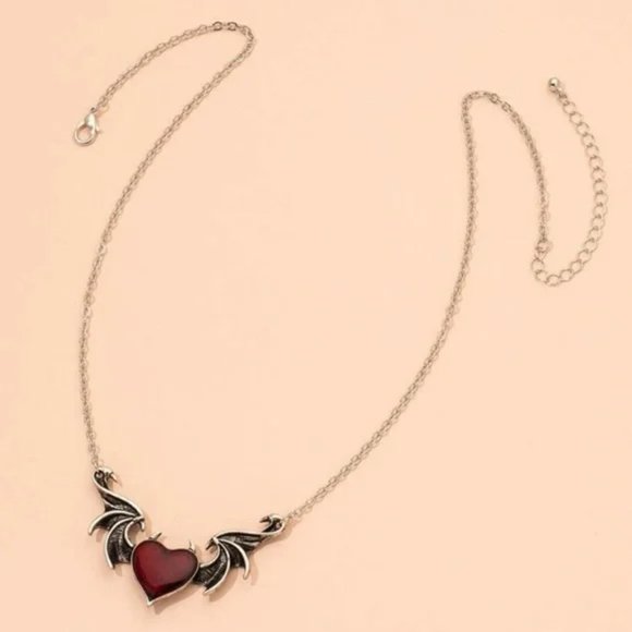 Moda Clothing Jewelry - Red Heart with Bat Wings